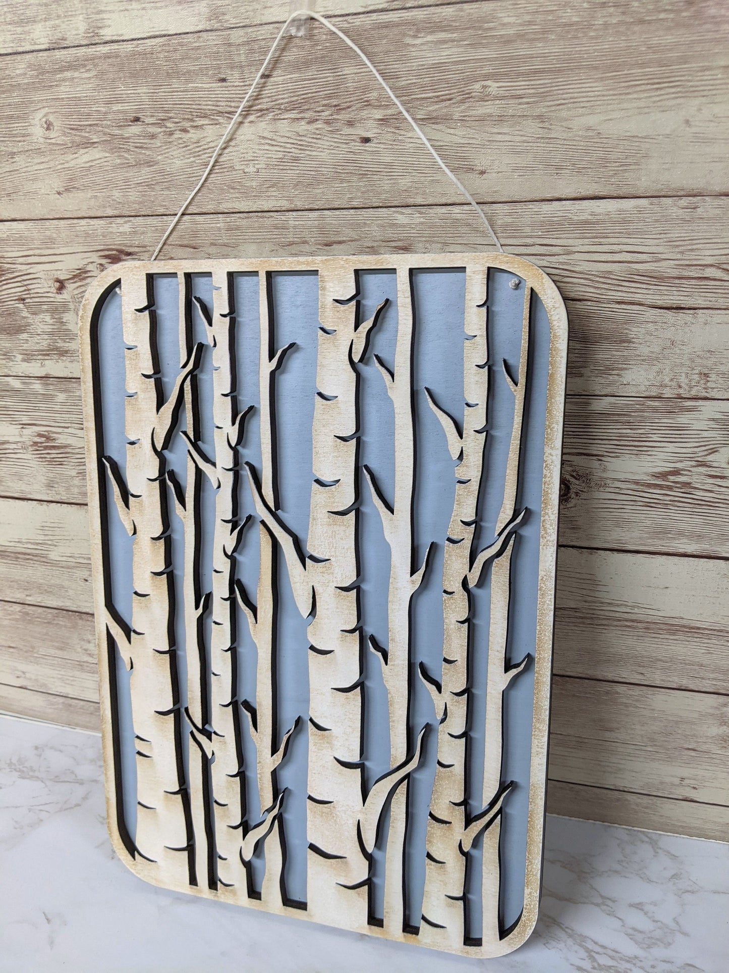 Birch Trees Wooden Laser Cut Wall Art - Light Blue Background