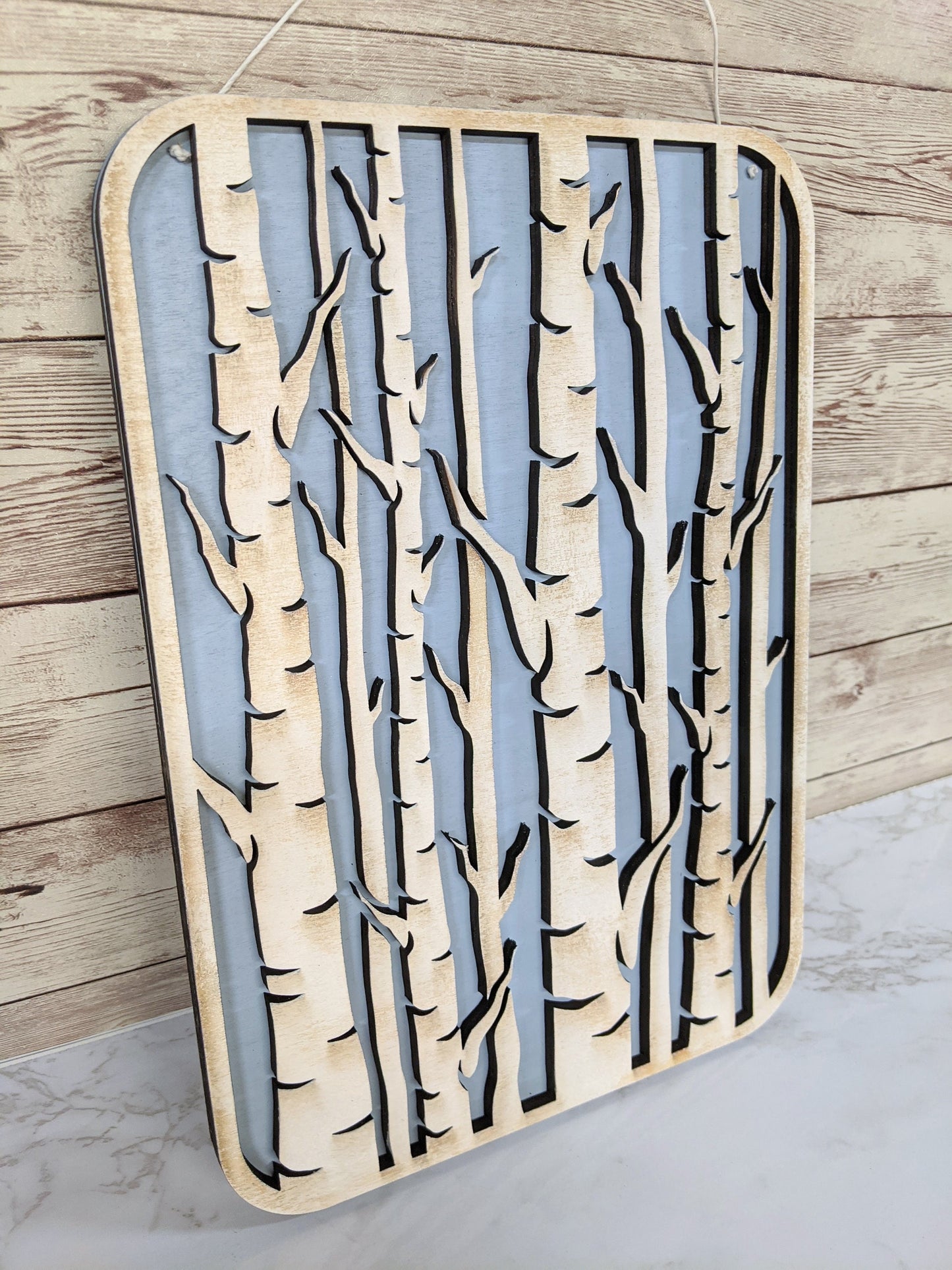 Birch Trees Wooden Laser Cut Wall Art - Light Blue Background
